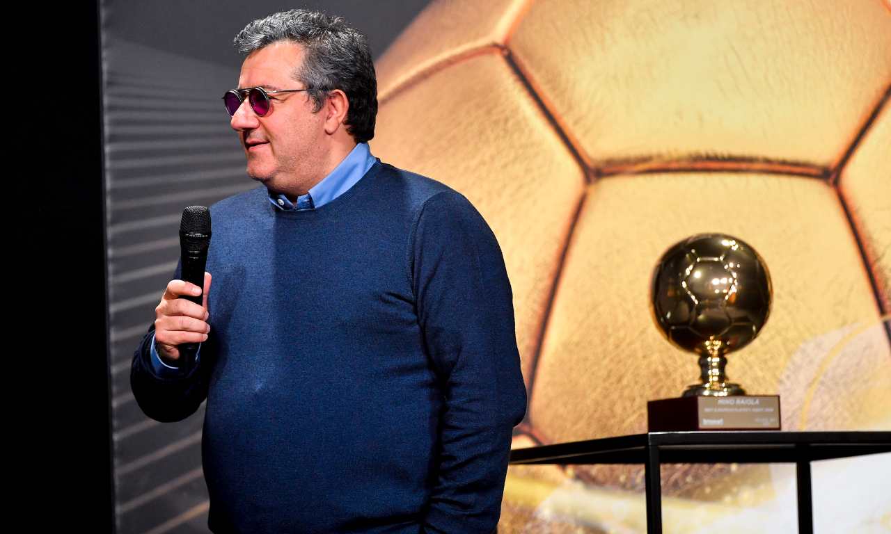 Mino Raiola col microfono