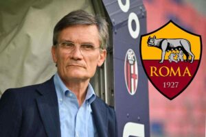 Giovanni Sartori, direttore sportivo del Bologna, con a fianco lo scudetto della Roma